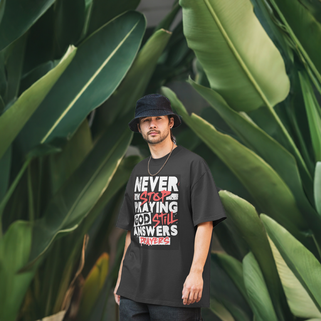 Never Stop Praying Oversized faded t-shirt