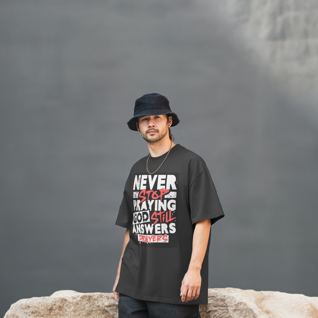Never Stop Praying Oversized faded t-shirt
