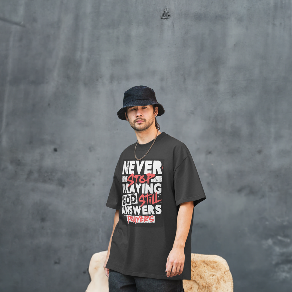 Never Stop Praying Oversized faded t-shirt